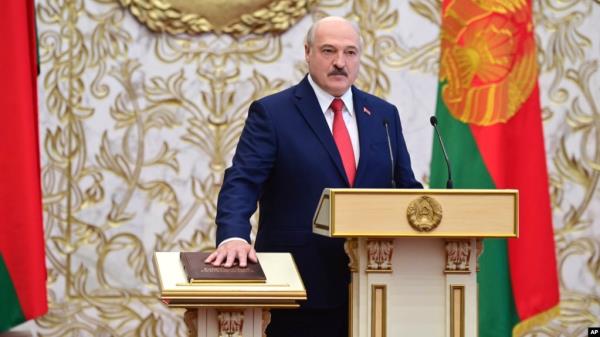 FILE - Belarusian President Alexander Lukashenko takes the oath of office at his inauguration ceremony at the Palace of the Independence in Minsk, Belarus, on Sept. 23, 2020.